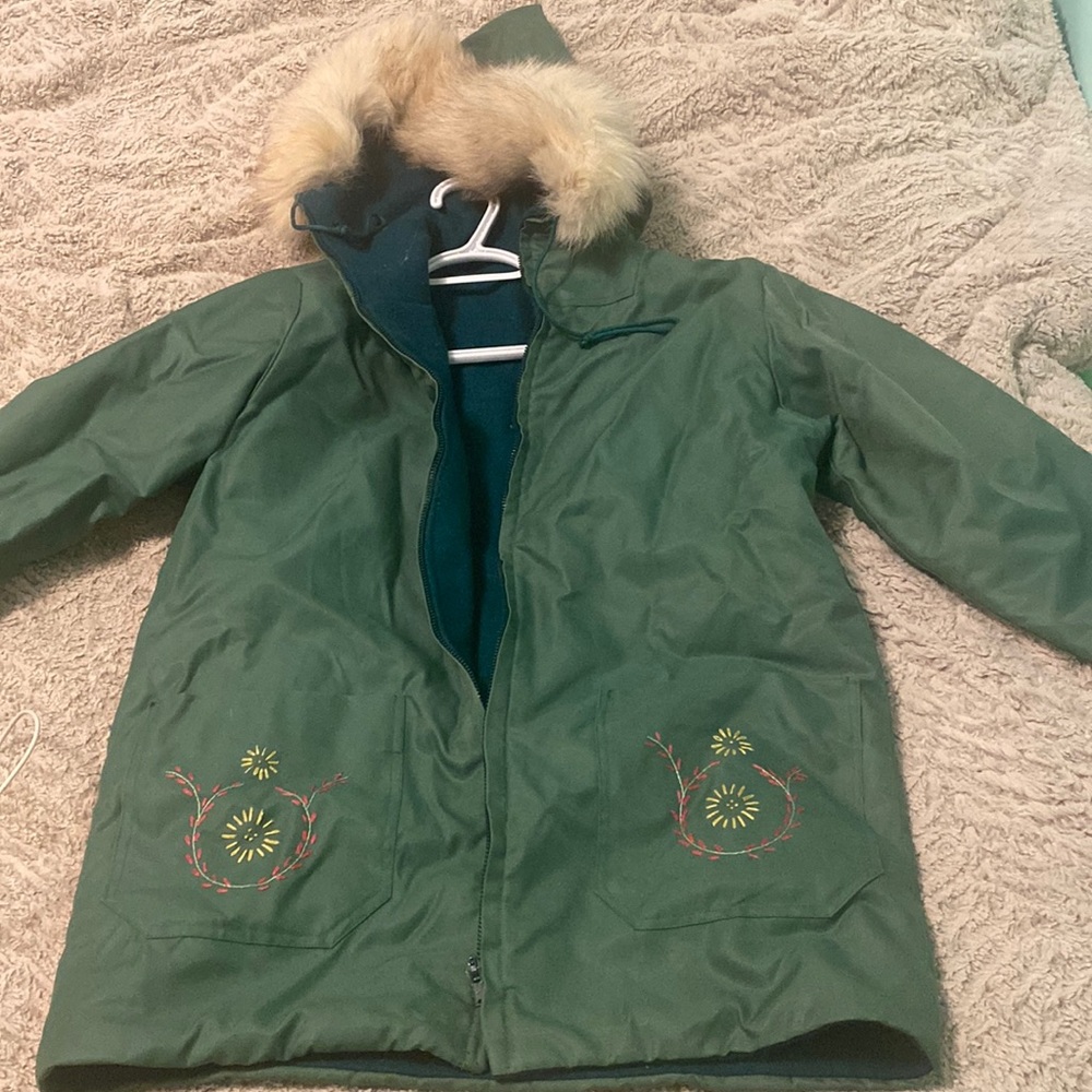 Vintage Newfoundland handcrafted parka with stitching details and fur hood. S/M